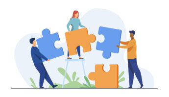 Partners holding big jigsaw puzzle pieces